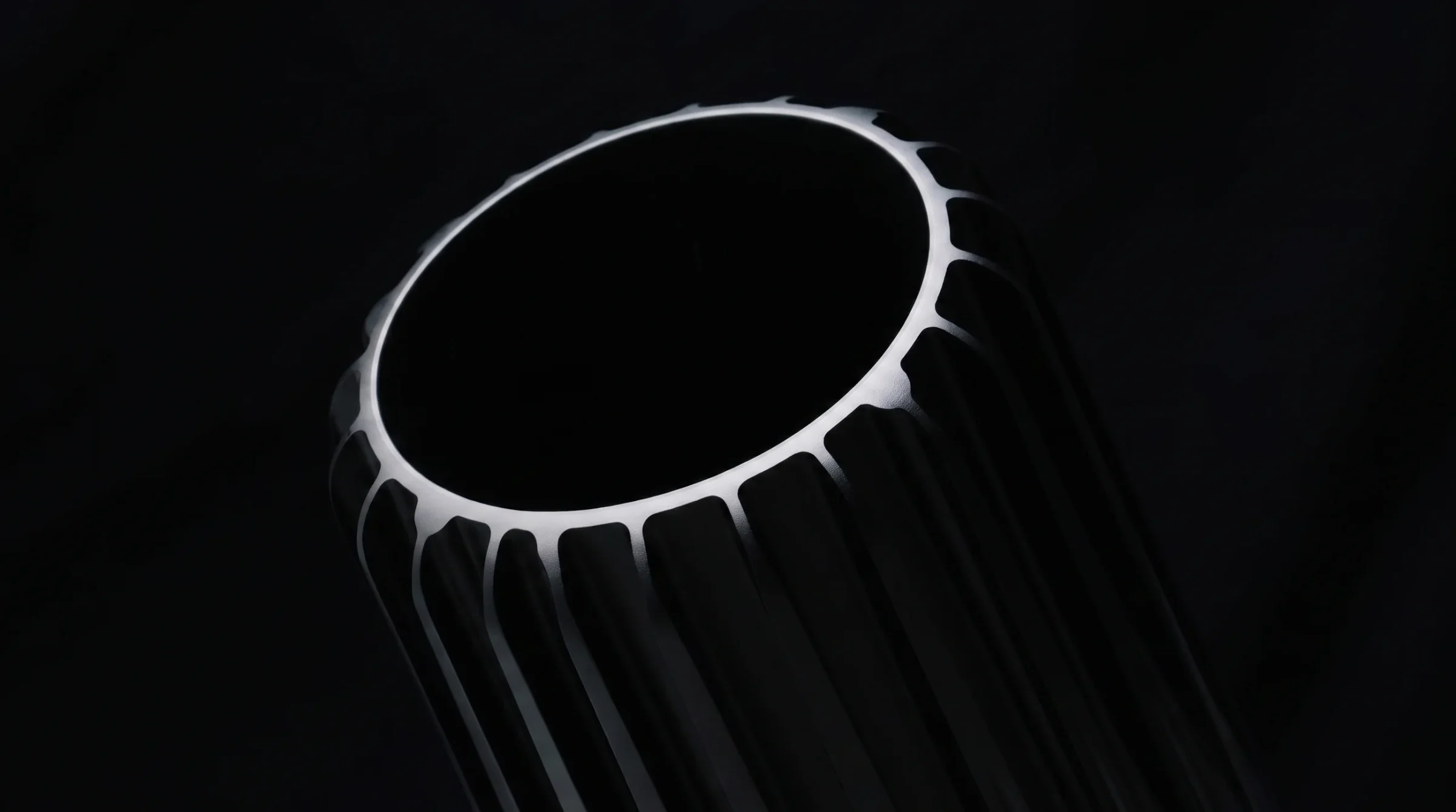 A ring-shaped instrument rendered against black